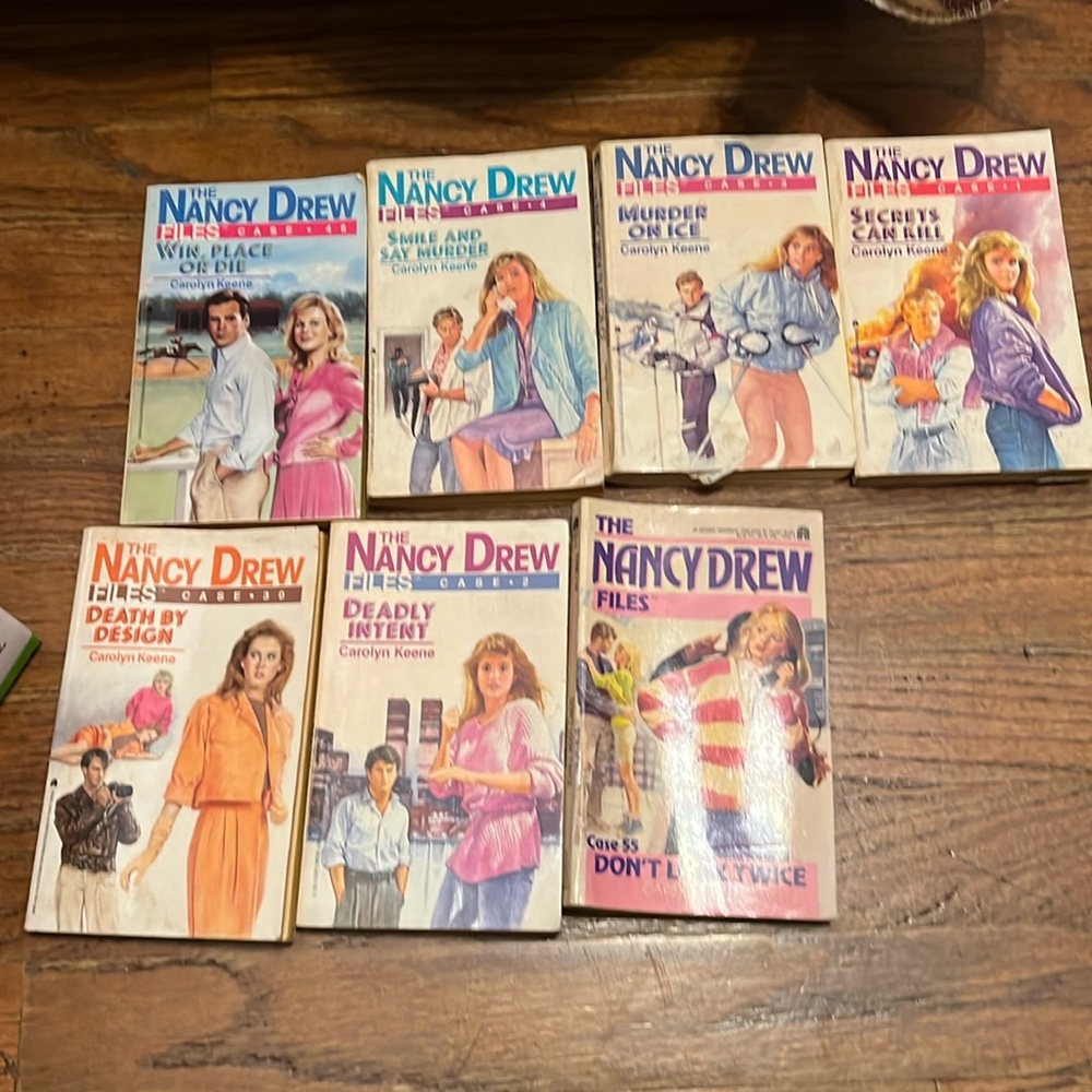 Nancy Drew books very old total of 7 they are old and smell old also